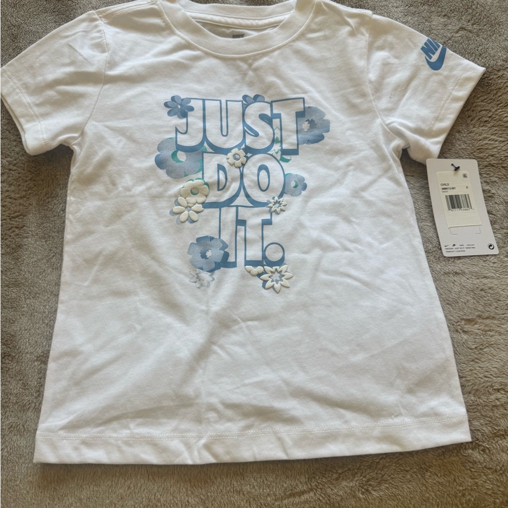 Nike Kids White Tee with Blue Floral Graphic
